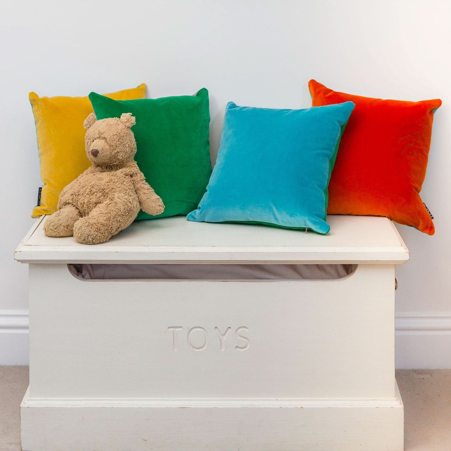 bright coloured cushion covers