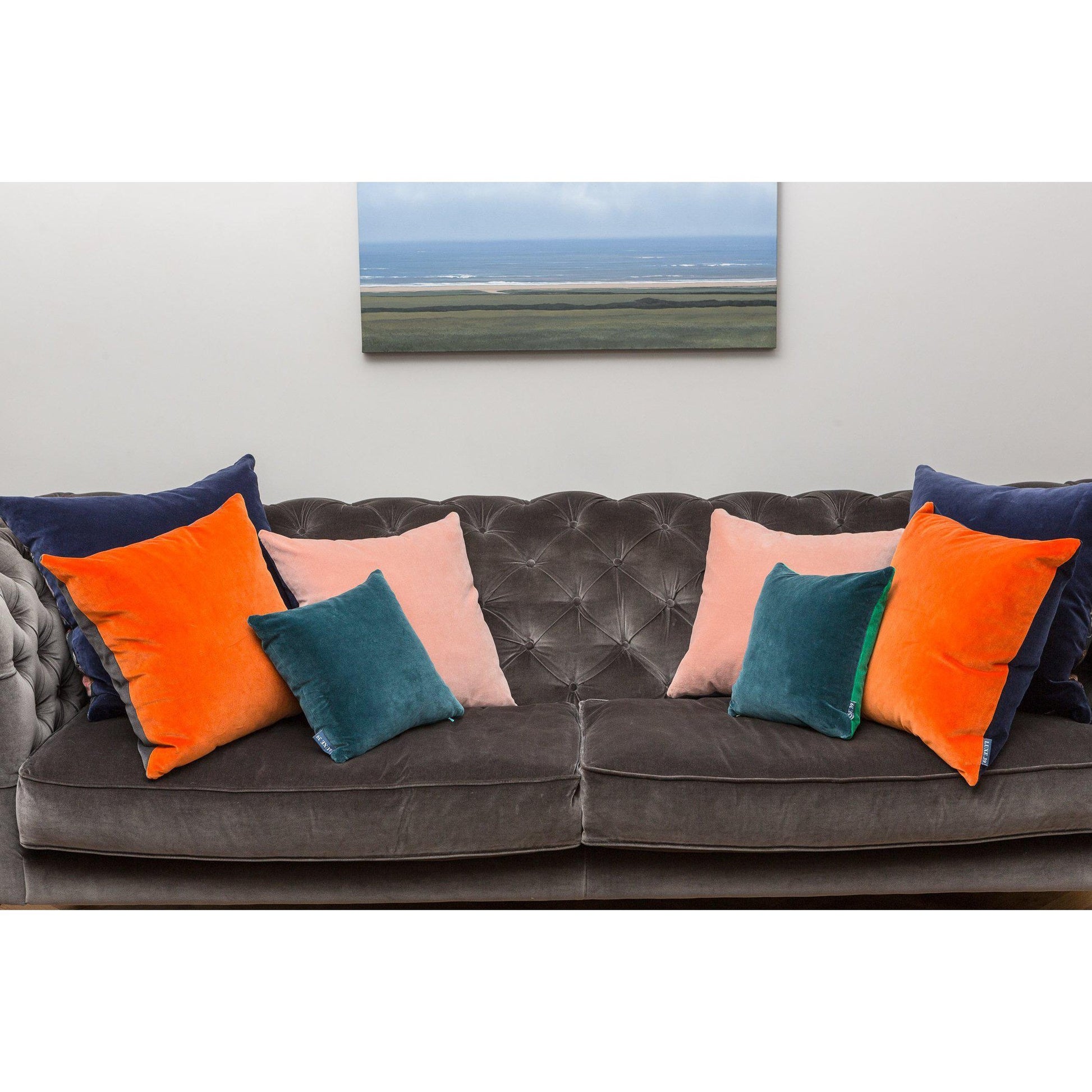 Teal coloured cushion with burnt orange by luxe 39
