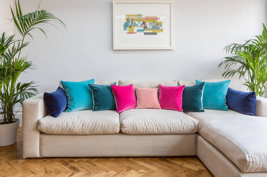 velvet cushions on a linen sofa