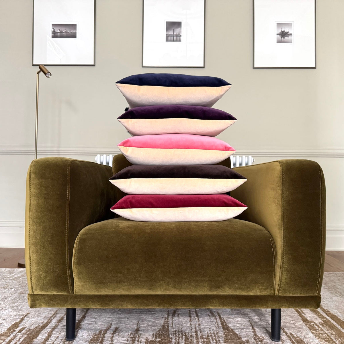 champagne cream velvet cushion covers on an olive velvet chair