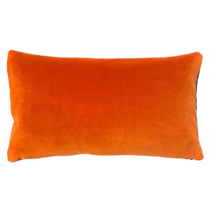 orange velvet cushion in oblong shape