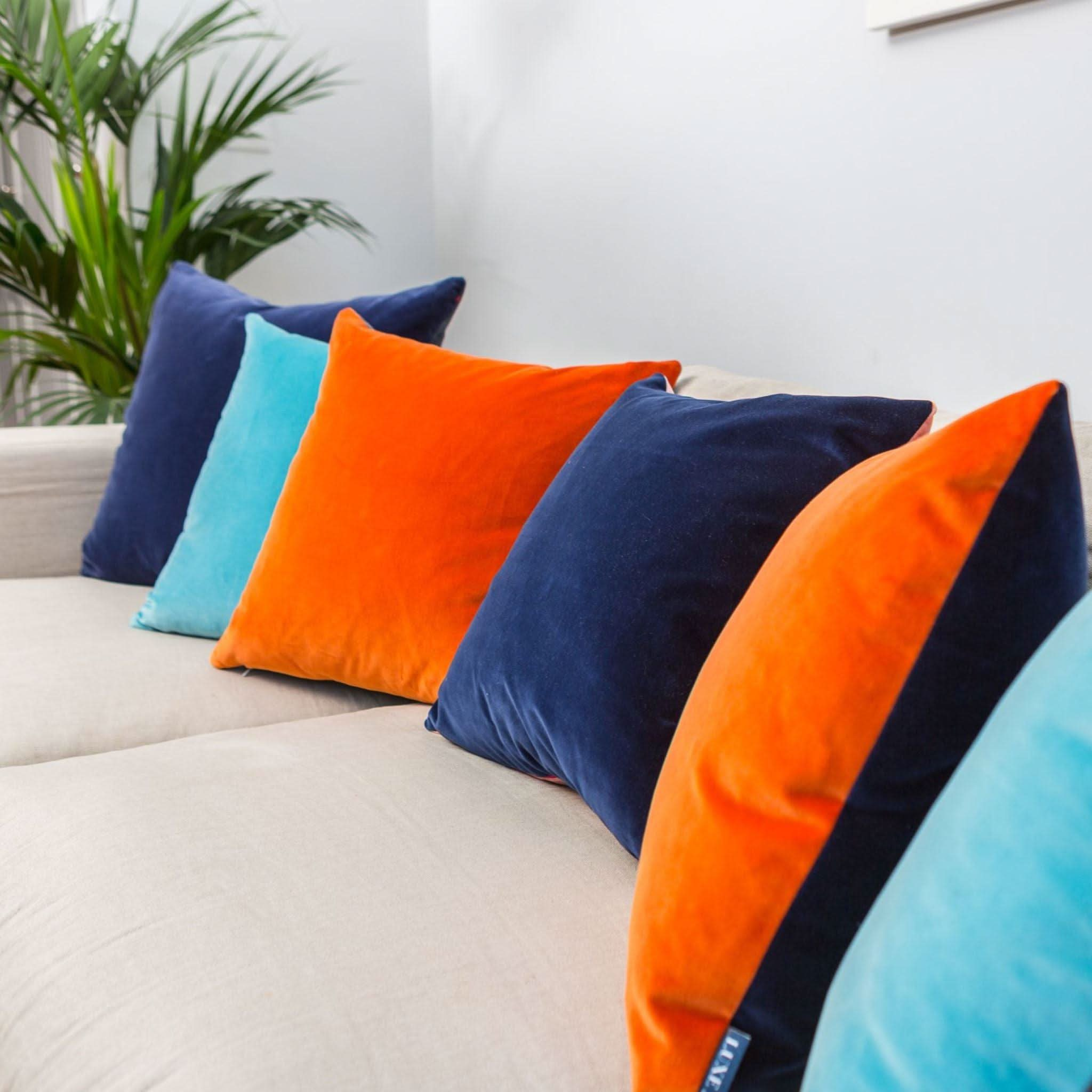 Bright orange outlet pillows