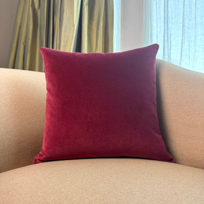 burgundy velvet cushion square on sofa