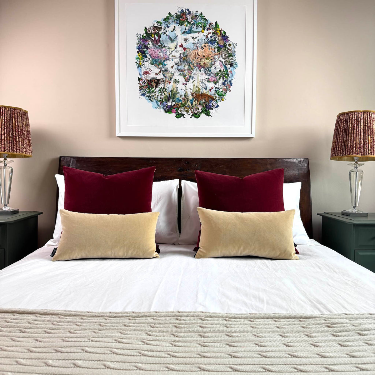 champagne velvet cushion covers with burgundy on wooden bed