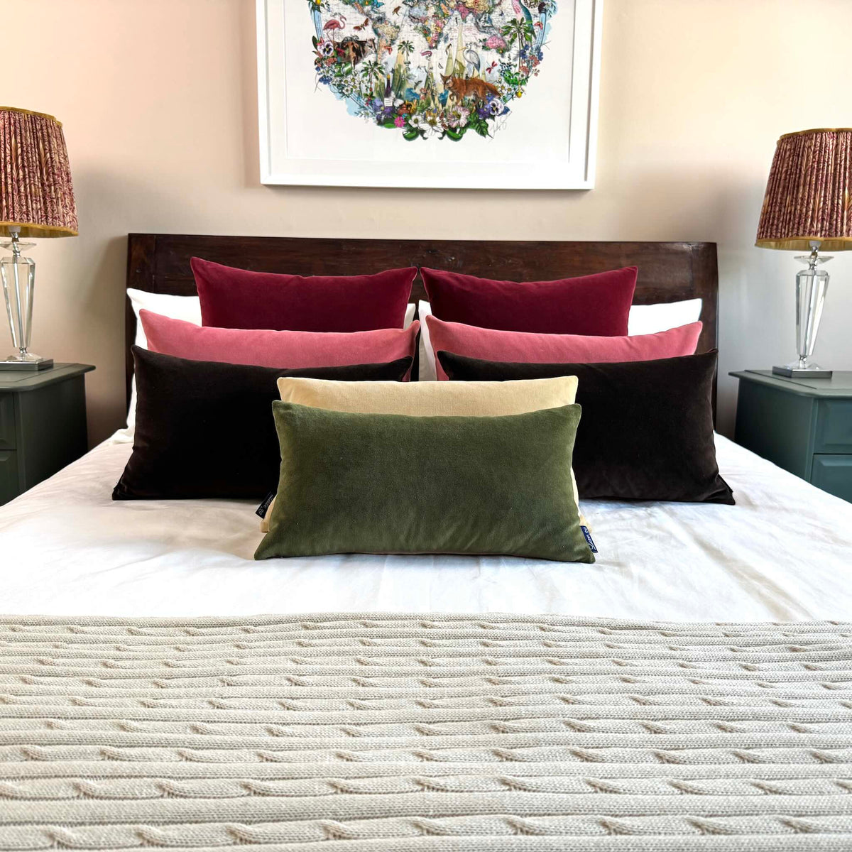 dark chocolate brown velvet cushion on wooden bed