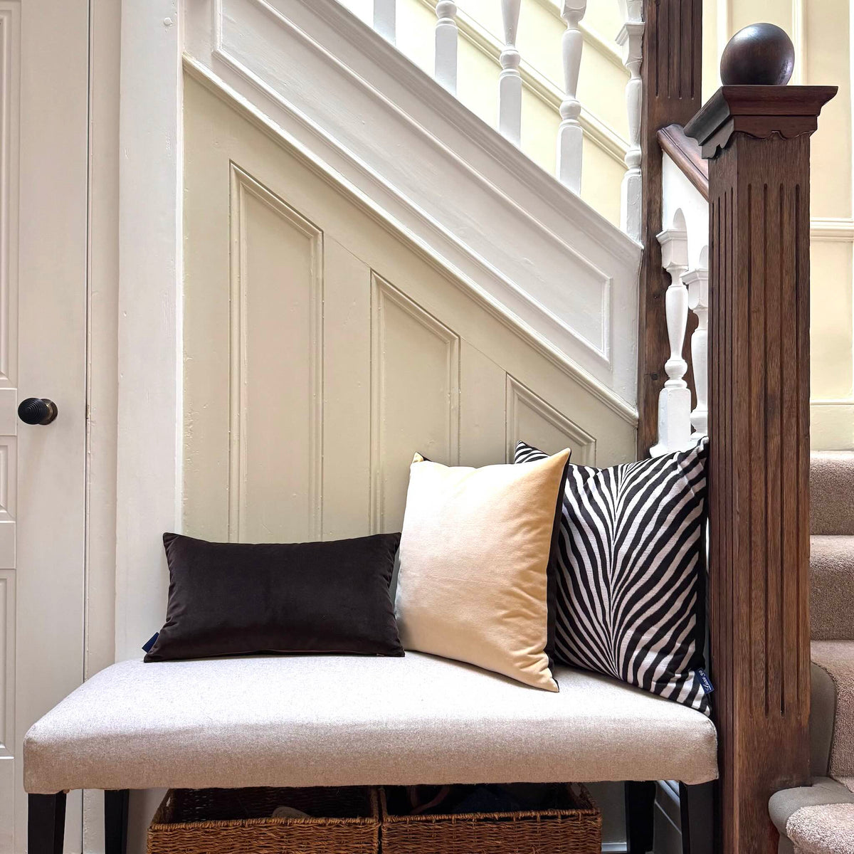 dark chocolate velvet cushion hallway