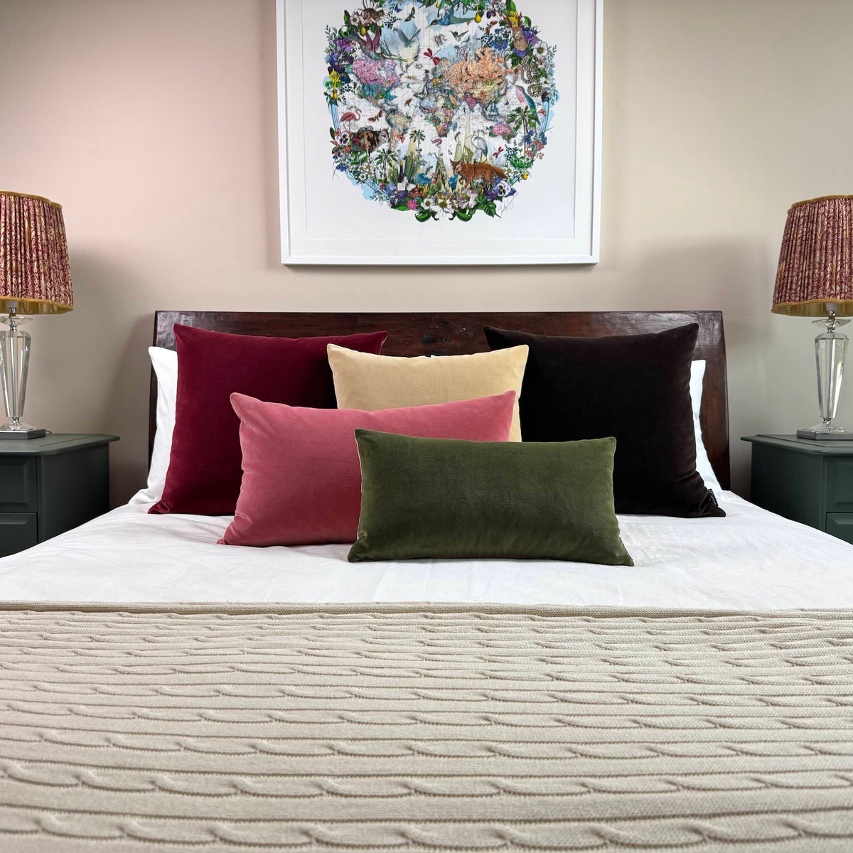 dark chocolate velvet cushions on wooden bed