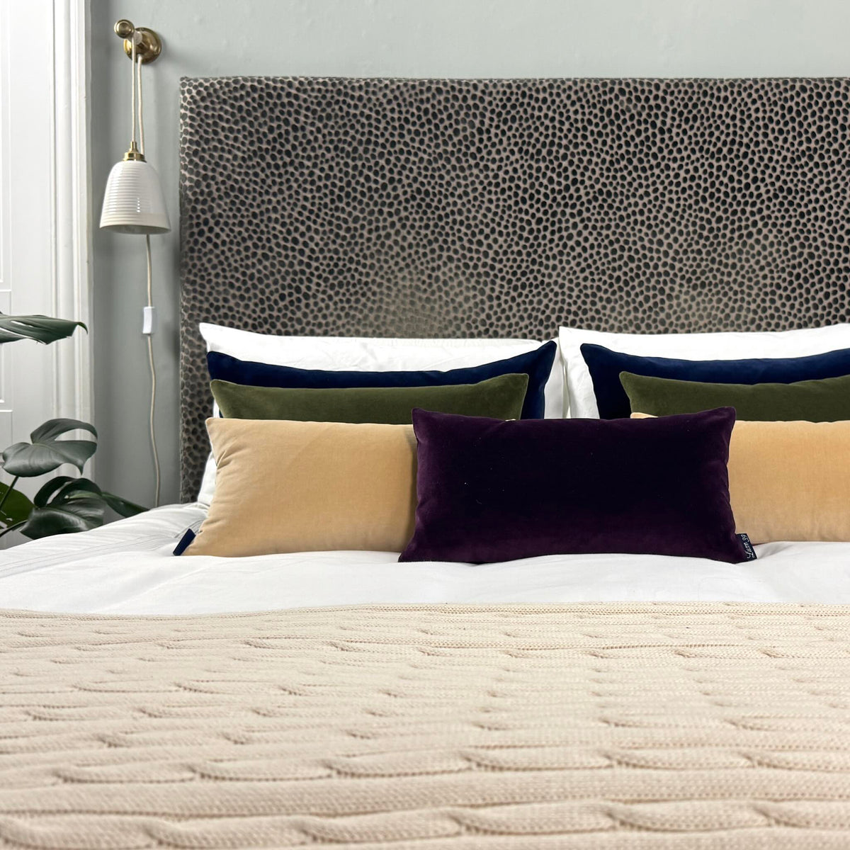 plum velvet cushion cover rectangle with champagne and olive cushions in blue room