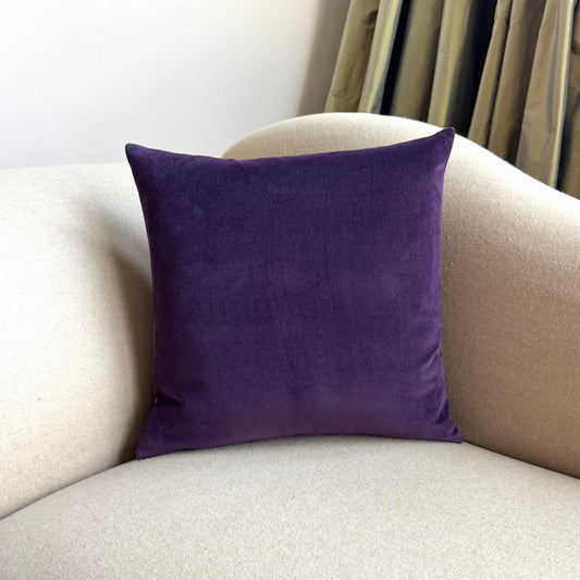 plum velvet cushion cover square on beige sofa