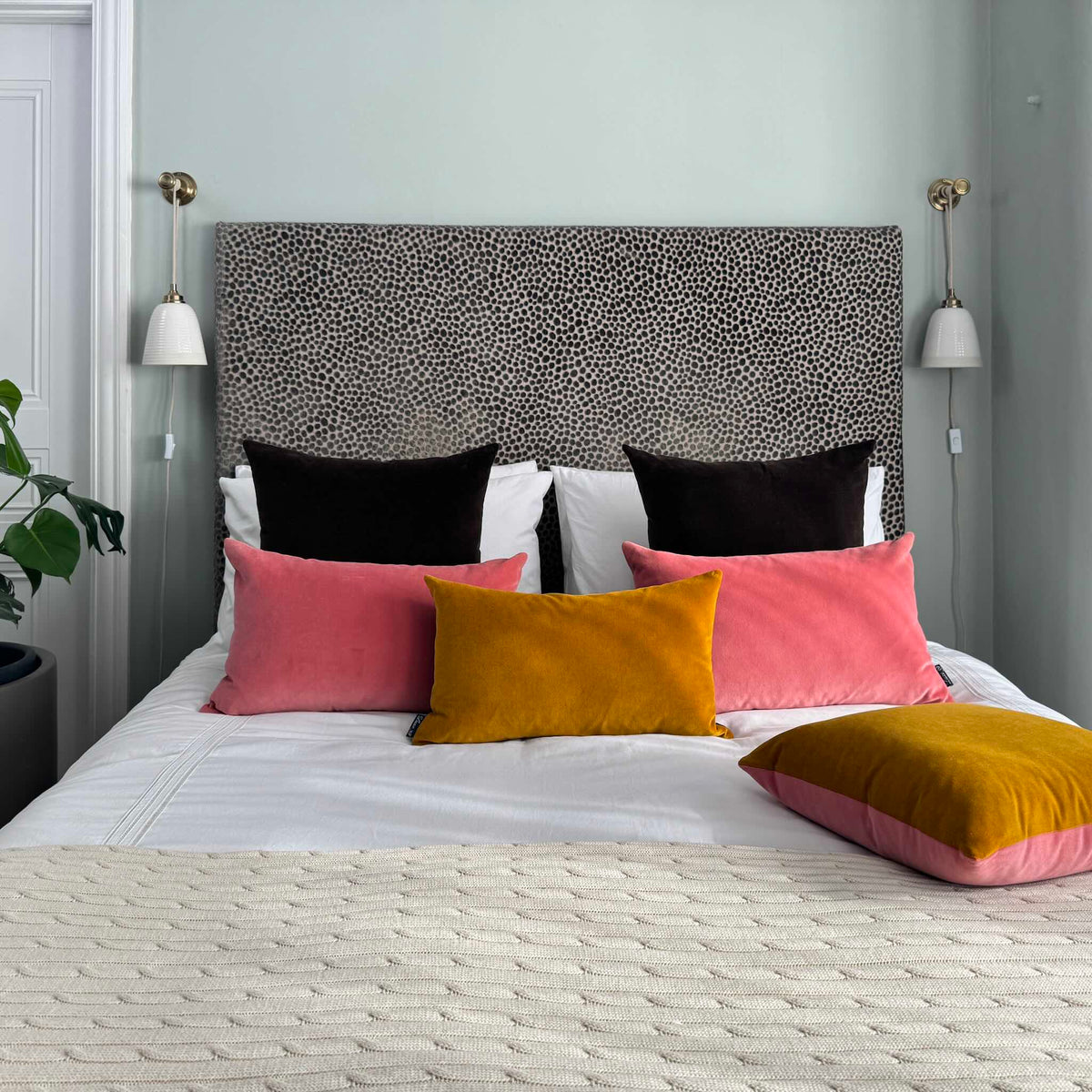 rose pink velvet cushion covers with gold ochre and dark chocolate in blue room
