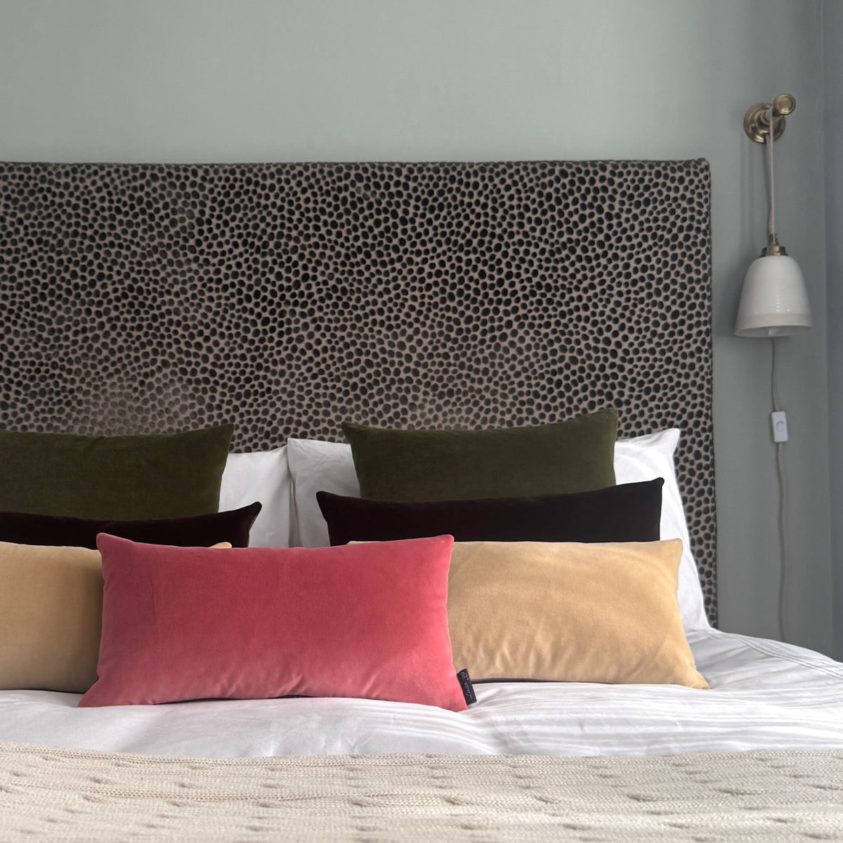 rose pink velvet cushion cover with champagne velvet on white bedding