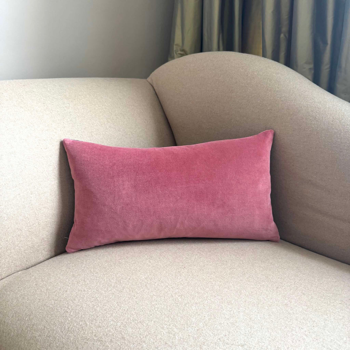 rose pink velvet cushion rectangle on beige sofa