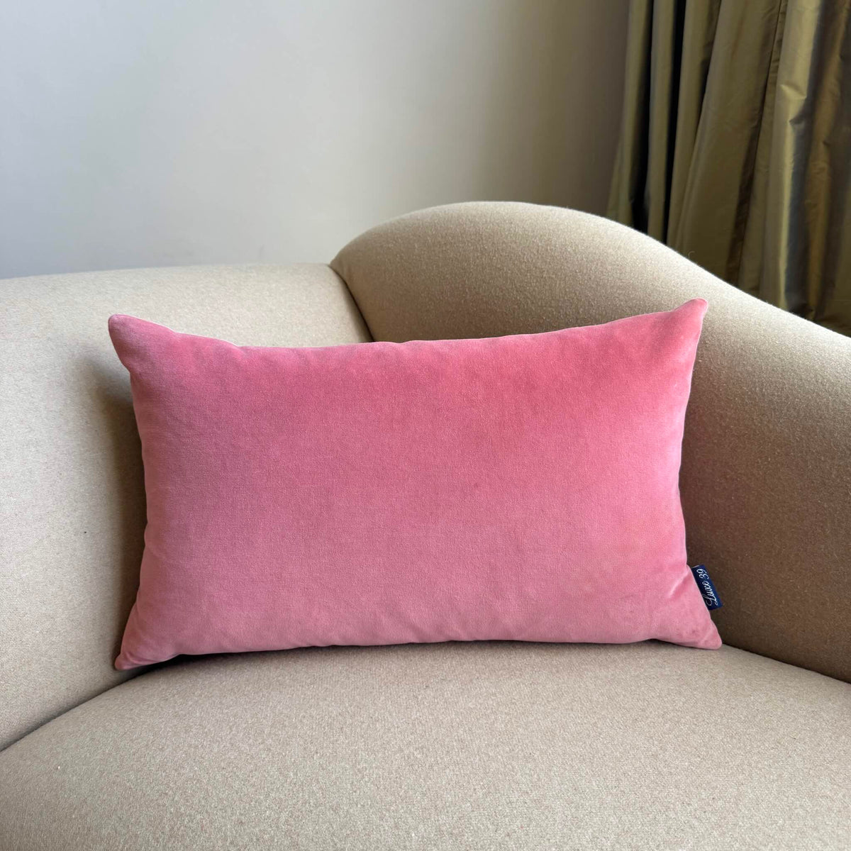 rouge pink velvet cushion rectangle on beige sofa