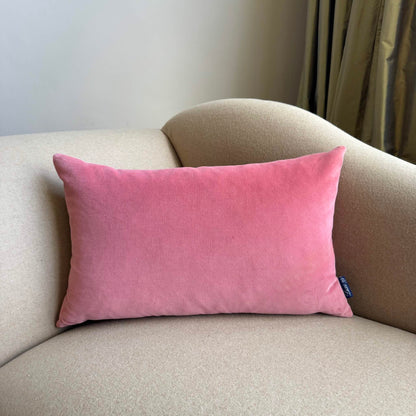 rouge pink velvet cushion rectangle on beige sofa