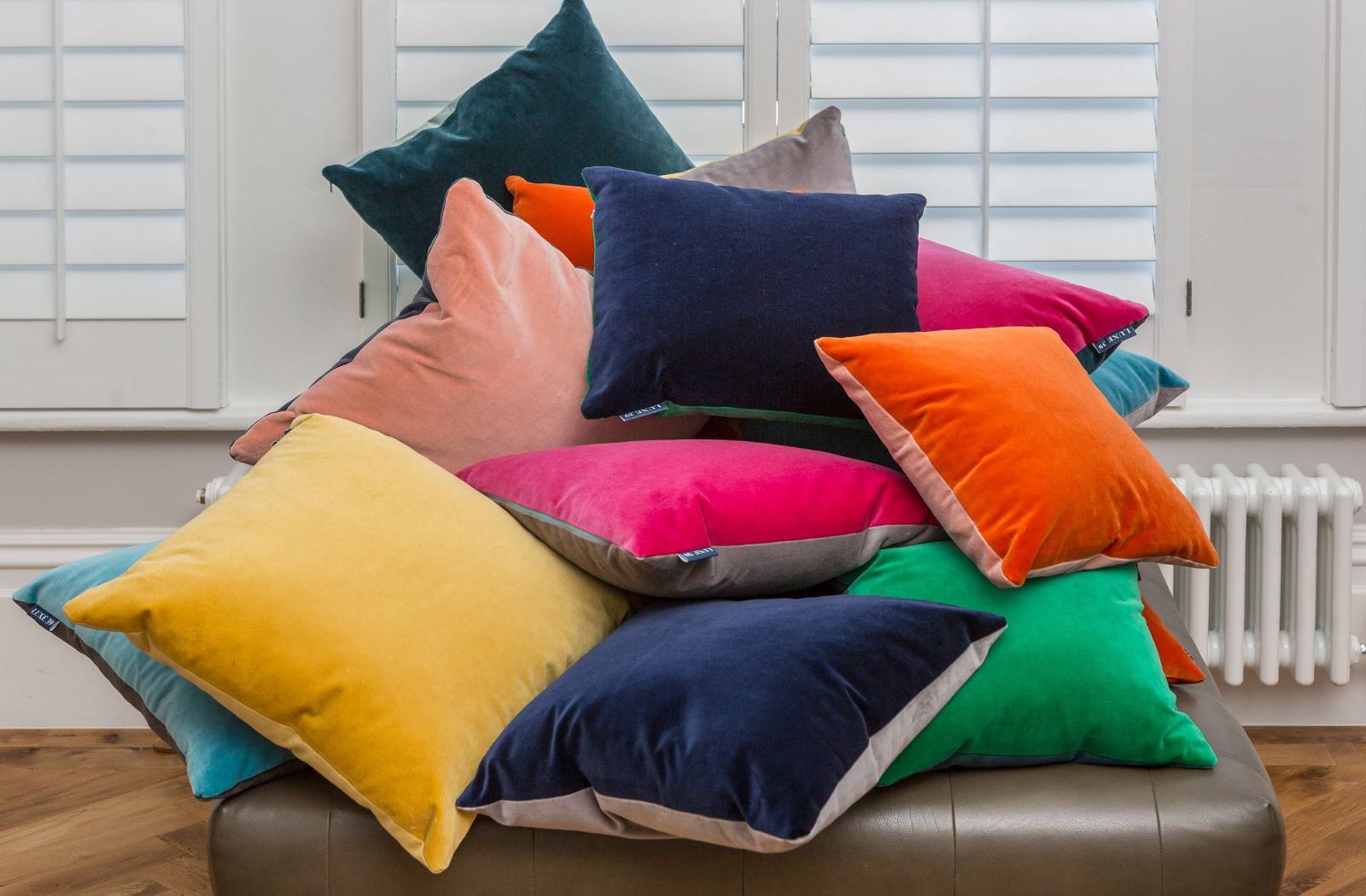 velvet cushions and velvet pillows piled up