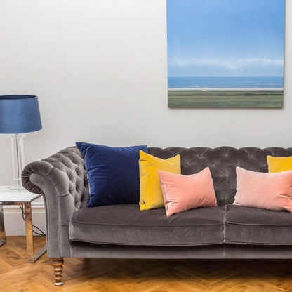 blush pink cushions with mustard and navy cushions