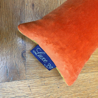 burnt orange velvet draft excluder