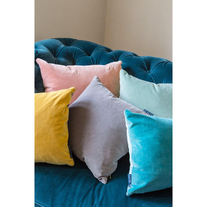 light grey velvet cushion with turquoise by luxe 39