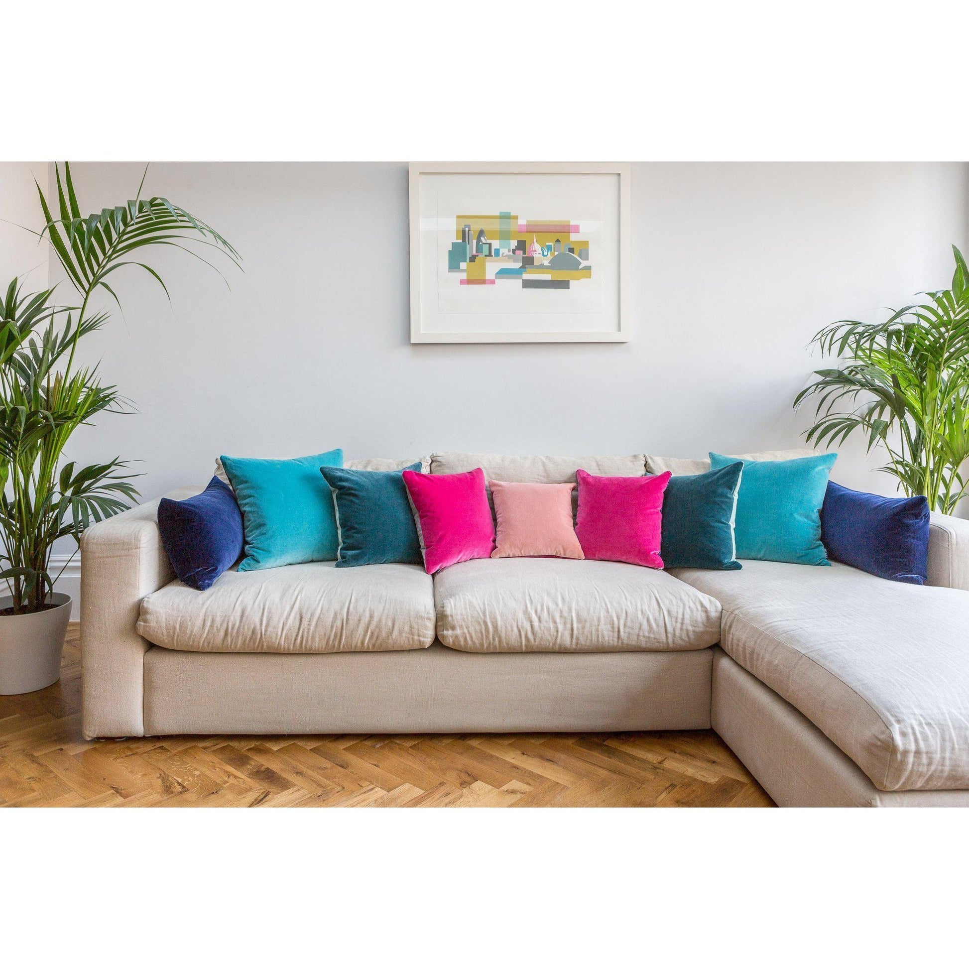 navy pink cushions by luxe 39 on a linen sofa