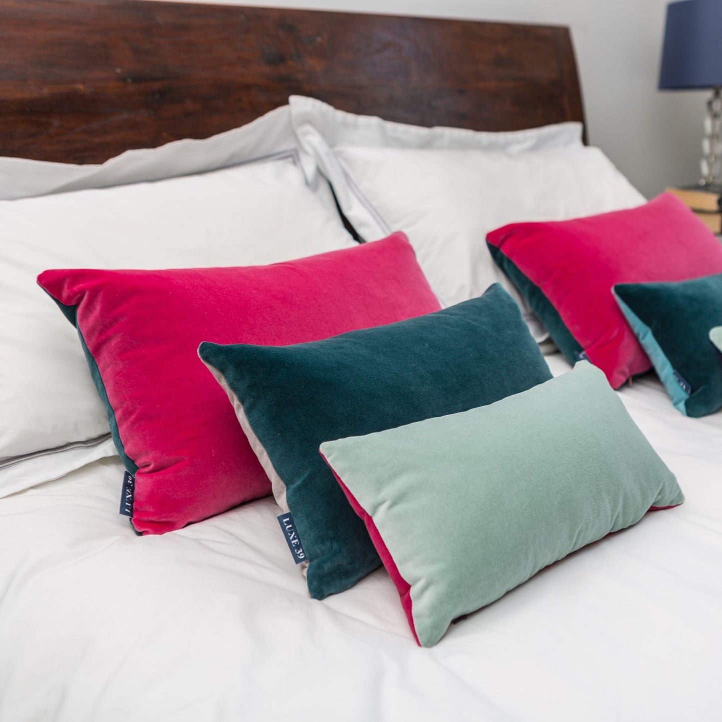 pink and teal cushion