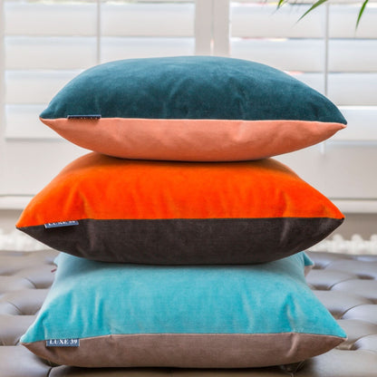 pink and teal cushions