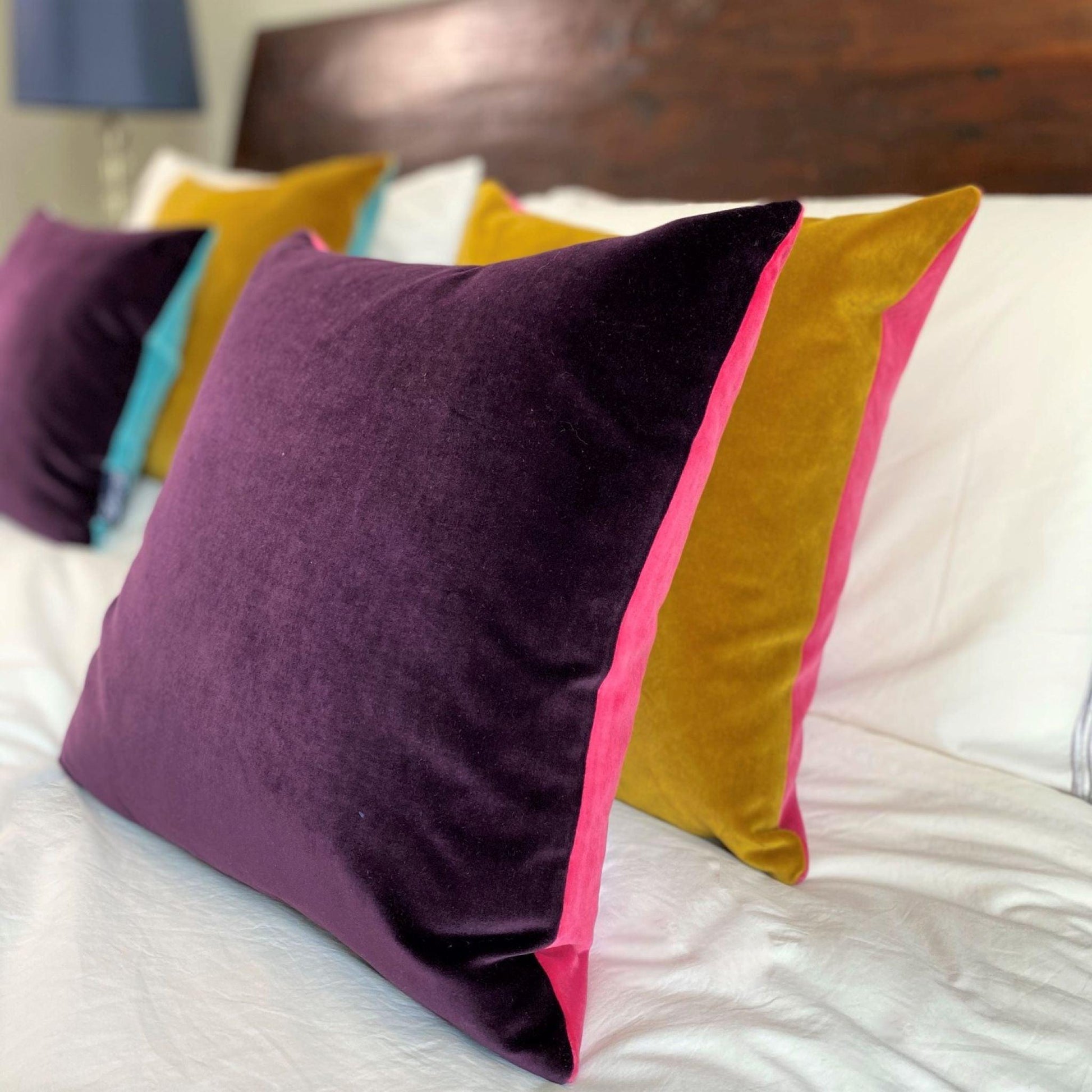 plain cushion covers in purple, pink and gold