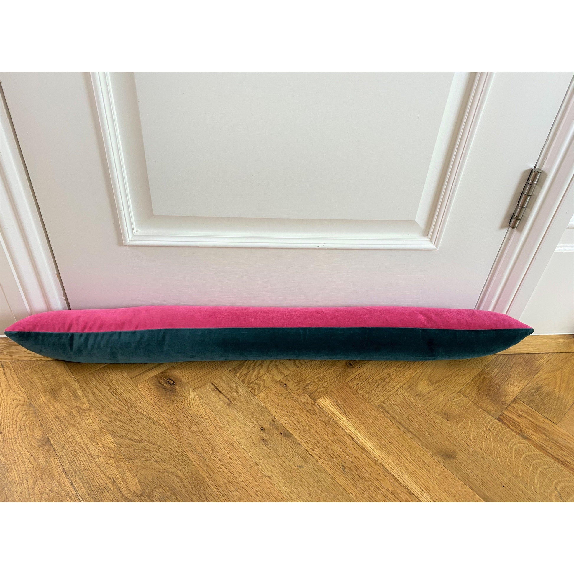 teal velvet draft excluder with bright pink
