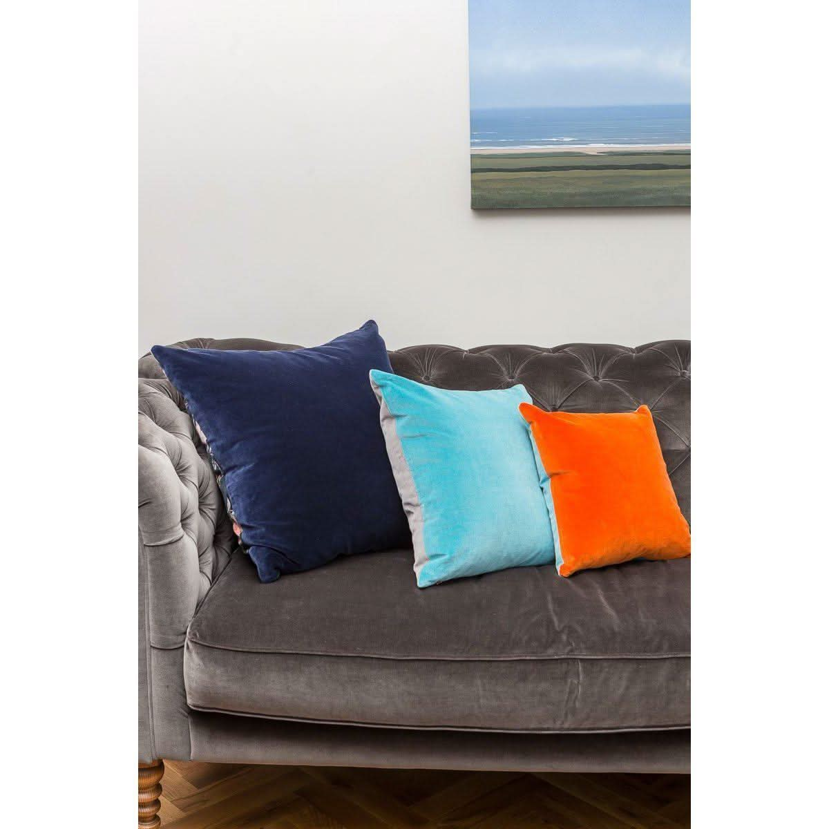 Grey sofa outlet with turquoise cushions