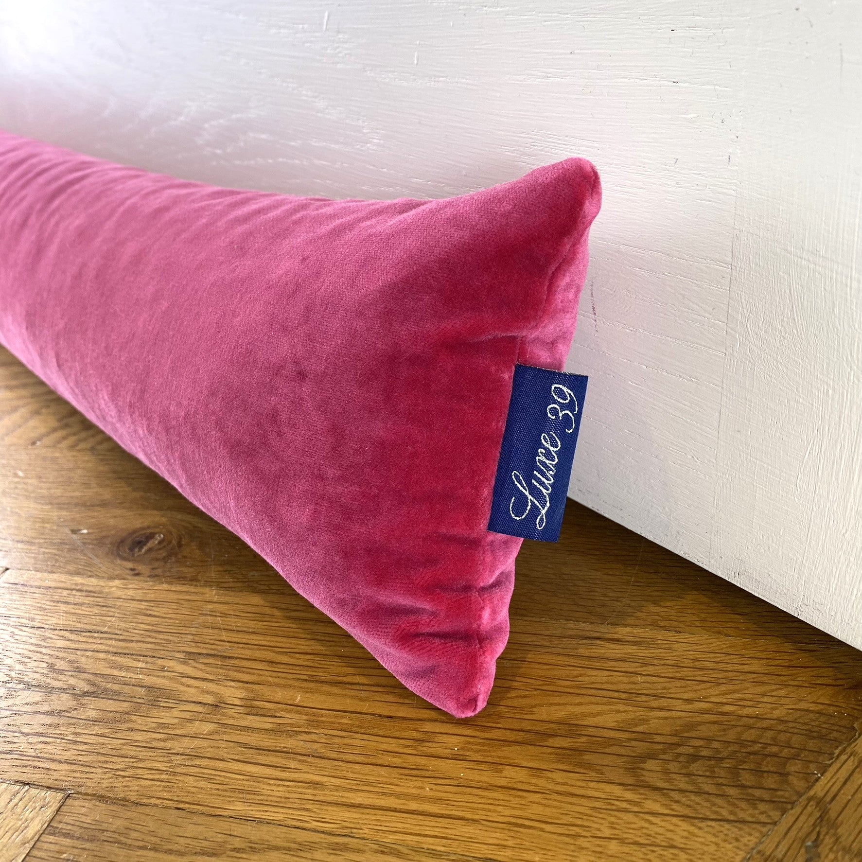 bright pink velvet draught excluder